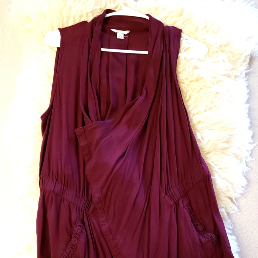Cute, plumb colored vest